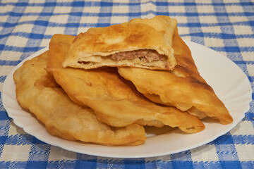 plate of chebureks, delicious homemade chebureks on the table