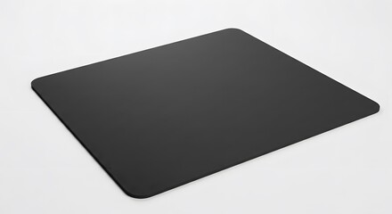 Minimalist black computer mousepad with rounded corners isolated on a clean white background, ideal for a mockup or template