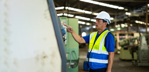 Asian old male engineering working : Manufacture technical and factory senior Asian staff standing at industry factory. Professional Mechanical Engineer