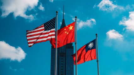 American, Chinese, and Taiwan Flags Flying Together with Skyscraper in Background