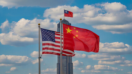 American, Chinese, and Taiwanese flags fly together against a partly cloudy sky.