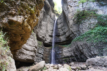 View of a waterfall from cliff in Chegem Gorge