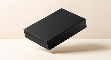 Minimalist Black Rectangular Box on Neutral Background Elegant Floating Packaging Design for Luxury Products and Modern Brand Presentations