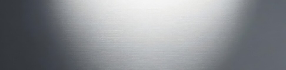 Brushed steel, fine linear grooves reflect light, close-up, background