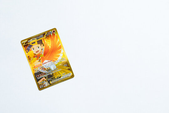 Ethan's Ho-oh EX Pok&eacute;mon trading card shot on a white paper background. It being a hyper rare card from the popular Japanese game franchise. Bradford, UK 06 12 2025