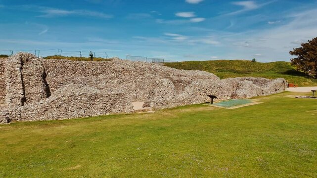 Weathered ramparts and ruined foundations reveal layers of history at Old Sarum, Salisbury, Wiltshire, England, UK