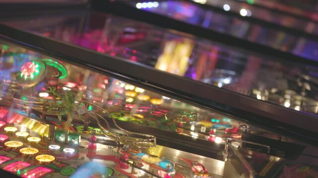 Pinball tables lined up at arcade detail view
