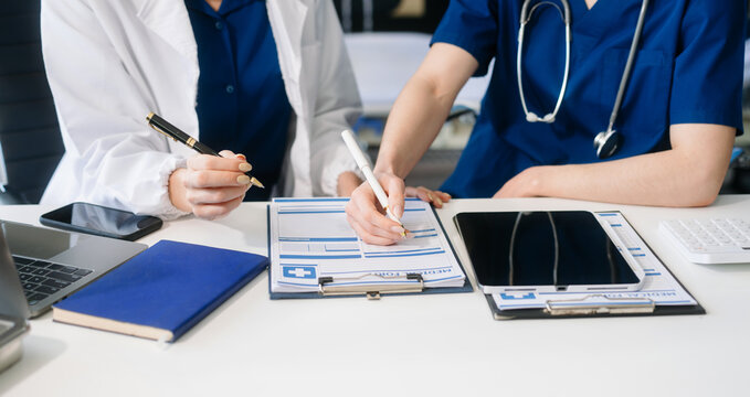 Medical technology network team meeting concept. Doctor hand working with smart phone modern digital tablet