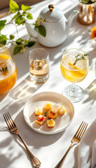 Elegant cocktail and gourmet appetizer on white linen, bathed in soft natural light.









