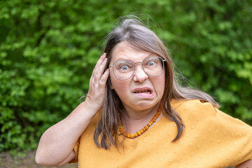 caucasian mature woman holding painful ear close up, hearing loss, Ear Discomfort, Hearing Test, Acute Otitis Media, Treatment and Care