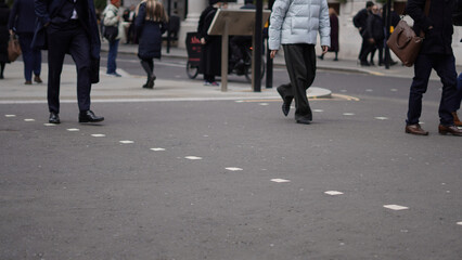 City workers walking to work on a weekday morning
