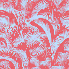 Seamless pattern with blue palm tree branches isolated on a pink background. Desert and tropical houseplants. 
