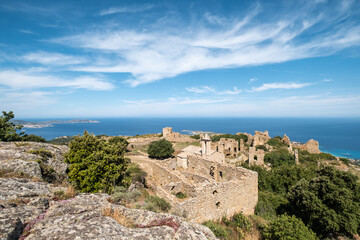 Abandoned in the 19th century the ruins of the village of Occi sit above Lumio and look down on the coastline of the Mediterranean island of Corsica. The church was restored in 2002.
