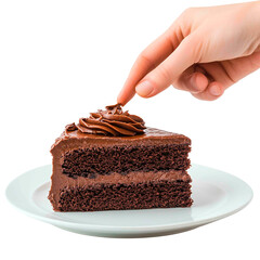 A hand decorates a delicious slice of rich chocolate cake with chocolate frosting, served on a pristine white plate. Dark background.