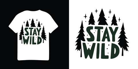 Fototapeta premium A white t shirt with the words stay wild and pine trees on a black background