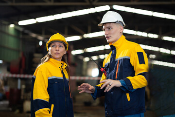 Unity and teamwork. People shaking hands on business agreement. Successful hand shaking after good deal. Professional Mechanical Engineer team Working at factory industrial facilities. Celebrate