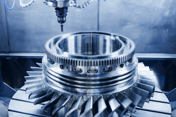 Precision engineering, cnc milling machine in action with metal component