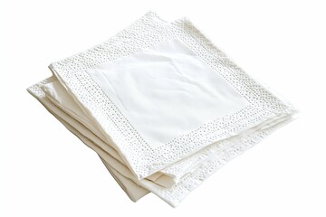 A stack of white napkins with a pattern on them.  , isolated on white background.