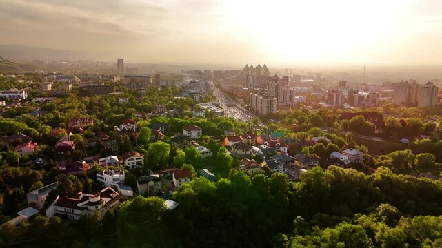 Aerial view panorama of houses and mountains in Almaty