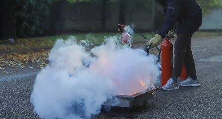 corporate safety - exercise during a firefighting course
