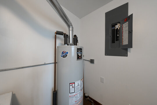 Detroit, Michigan -USA- May 12, 2025: new hot water tank has been professionally insltalled illustrating a update to an older home