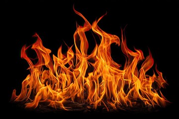 Fiery flames against black backdrop