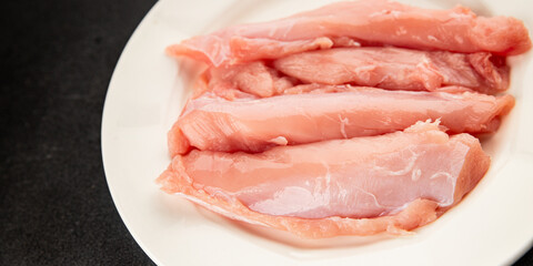 Rabbit raw meat fillet dietary fresh delicious gourmet food background on the table rustic food top view copy space keto and paleo diet