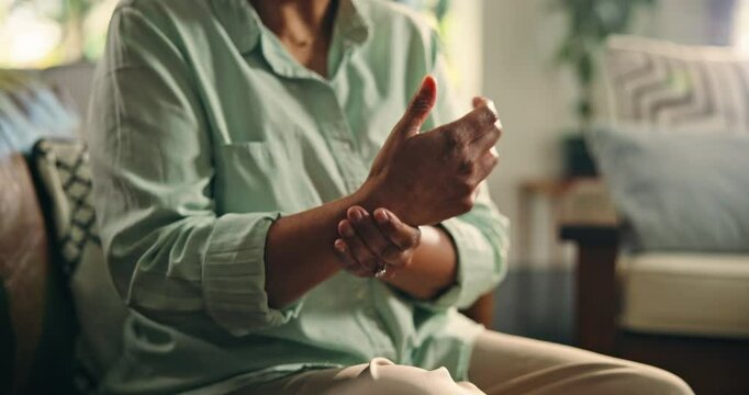 Mature, woman and hand with wrist pain, muscle ache or tension for rheumatoid arthritis. Inflammation, osteoporosis or carpal tunnel syndrome with circulation issue, joint strain or swollen at home