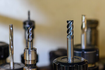 Close-up scene the used flat nose or square solid end mill tools.