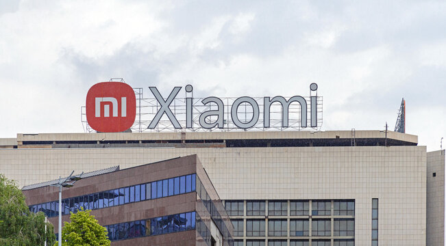 Chinese Xiaomi Mi Tech Company Sign at Top of Office Building in New Belgrade Serbia