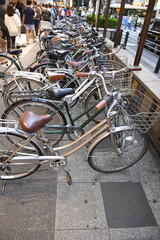 Bicycles Parked on a Busy Tokyo Street