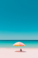 Sunny beach scene with umbrella