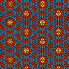 Seamless kaleidoscope floral pattern vibrant red and green blossoms on blue design for fabric, wallpaper, and backgrounds