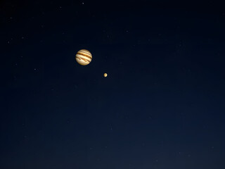 Jupiter and Mercury align in a starry night, a rare celestial dance of planets