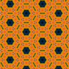Seamless kaleidoscope floral pattern vivid orange and blue geometric floral design for fabric, wallpaper, and backgrounds