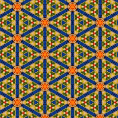 Seamless kaleidoscope floral pattern geometric arrangement of triangles and floral motifs, design for fabric, wallpaper, and backgrounds