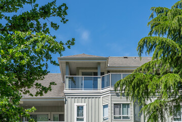 Top of modern apartment building with nice windows in Summer in Vancouver, Canada, North America....