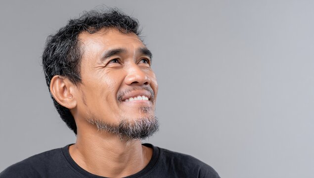 Man Looking Upward With A Smile