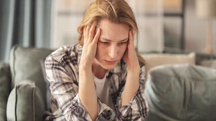 Sad young woman dealing with loss and psychological trauma