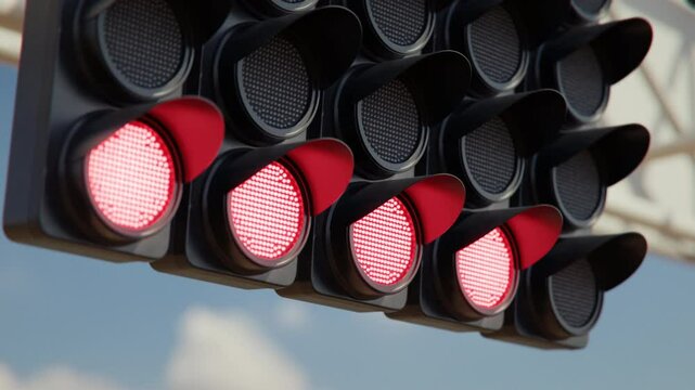 Close up of the formula one car racing starting lights sequence signalling the beginning of the race. 3d animation rendering