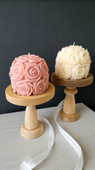 Rose Shaped Pillar Candles on Wooden Stands