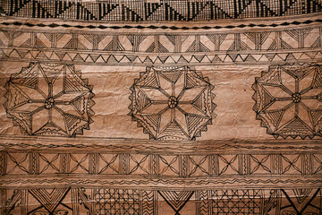 Paris, France : Barkcloth with geometric patterns from ‘Uvea, Wallis and Futuna. Traditional tapa cloth decorated with natural pigments, Polynesian heritage. Quai Branly Museum, Paris
