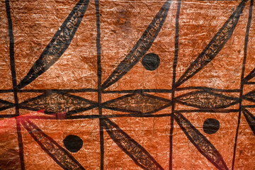 Paris, France : Barkcloth with geometric patterns from ‘Uvea, Wallis and Futuna. Traditional tapa cloth decorated with natural pigments, Polynesian heritage. Quai Branly Museum, Paris