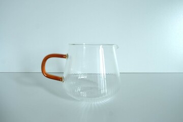 glass pot with handle for coffee maker, Coffee Drip Set, Pouring drip coffee into the glass pot, for coffee drip - with white background