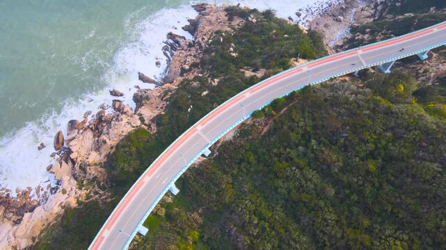 Drone views beautiful coastal highway running along the coastline of Dongshan Island, Fujian Province, China