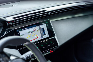 Car's infotainment system with reverse camera display on the dashboard