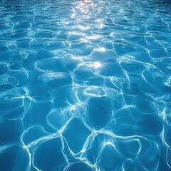 Close-up view of clear, shimmering water with sunlight reflections creating patterns.