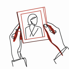 Hands holding photo frame
