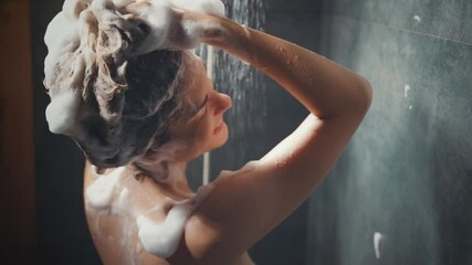 close-up happy woman smiling face taking shower rain under water drops streams applies shampoo to long wet hair hands fingers create foam. Girl enjoying soaps bathing back rear view healthy self care - Powered by Adobe