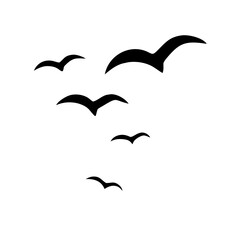 Silhouette of a flock of seagulls flying against a plain background.



